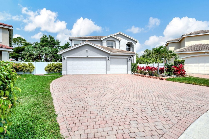 Welcome to this exquisite 5-bedroom, 3-bathroom home nestled in - Beach Home for sale in Greenacres, Florida on Beachhouse.com