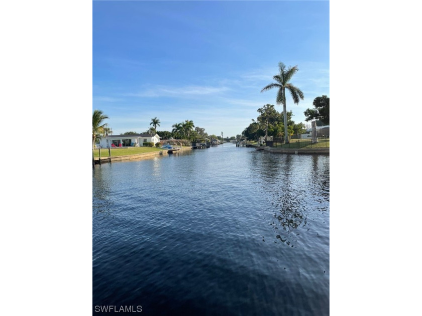 FIRST FLOOR INTERSECTING CANALS and redone inside! LOOKS BRAND - Beach Condo for sale in Cape Coral, Florida on Beachhouse.com