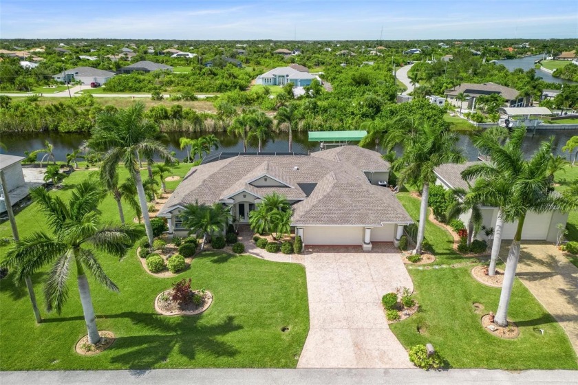 Welcome to this waterfront 3,074-square-foot oasis of luxury - Beach Home for sale in Port Charlotte, Florida on Beachhouse.com