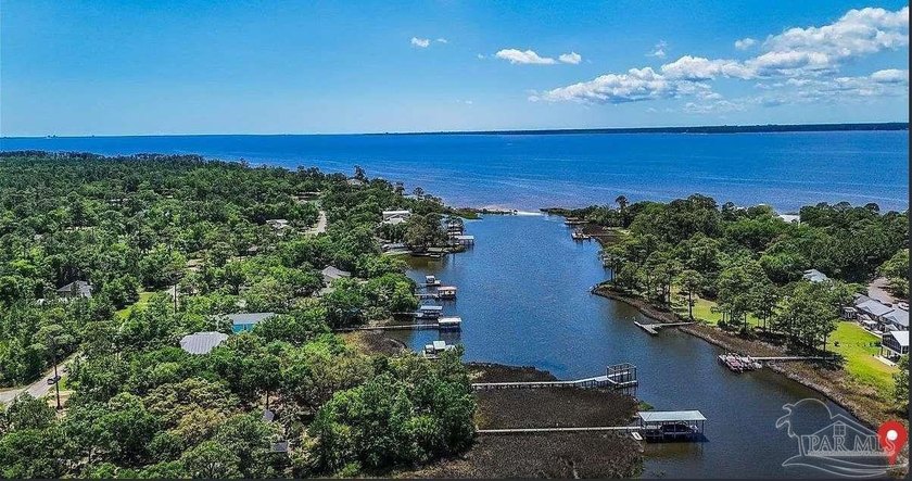 Discover a rare opportunity to build your dream waterfront home - Beach Lot for sale in Milton, Florida on Beachhouse.com