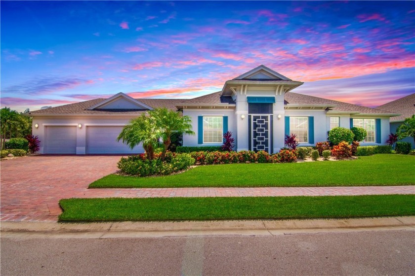 Nestled on a tranquil corner lake lot in the highly sought after - Beach Home for sale in Vero Beach, Florida on Beachhouse.com