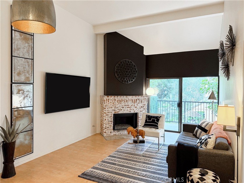 Upstairs with soaring cathedral ceilings. Remodeled kitchen. A - Beach Condo for sale in Huntington Beach, California on Beachhouse.com