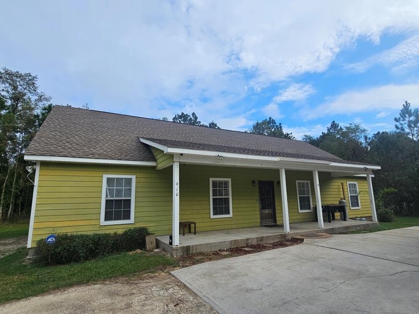 Dive into this home that is conveniently located close to - Beach Home for sale in Waveland, Mississippi on Beachhouse.com