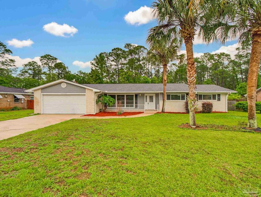 This beautifully maintained home offers the lifestyle today's - Beach Home for sale in Pensacola, Florida on Beachhouse.com