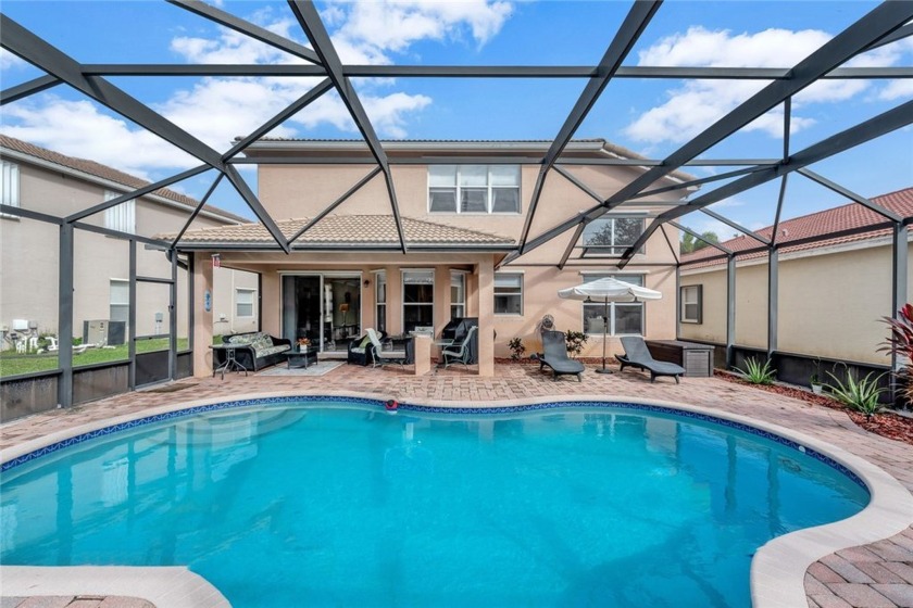 Elegant 5BR 3BA pool home nestled in a gated community with low - Beach Home for sale in Vero Beach, Florida on Beachhouse.com