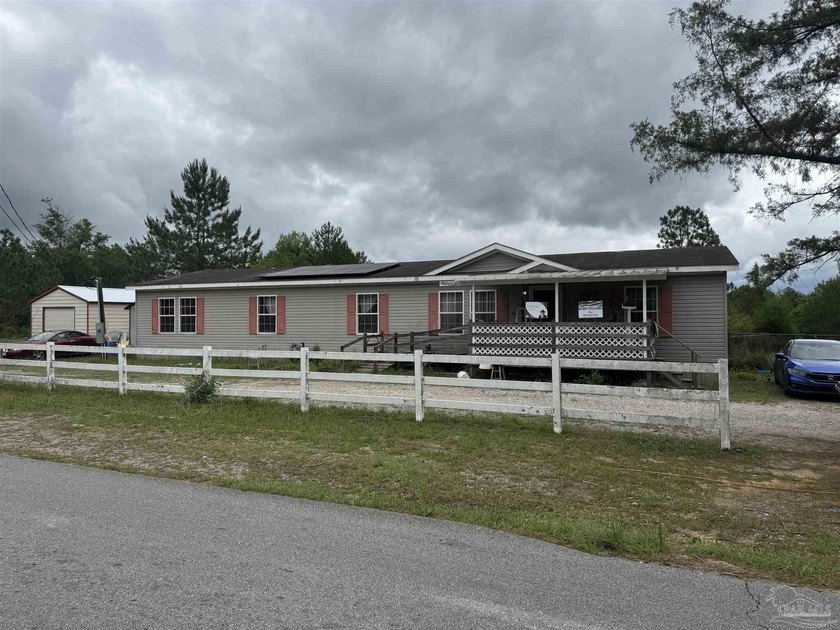 Large manufactured home located on 1 acre. Fireplace, covered - Beach Home for sale in Milton, Florida on Beachhouse.com