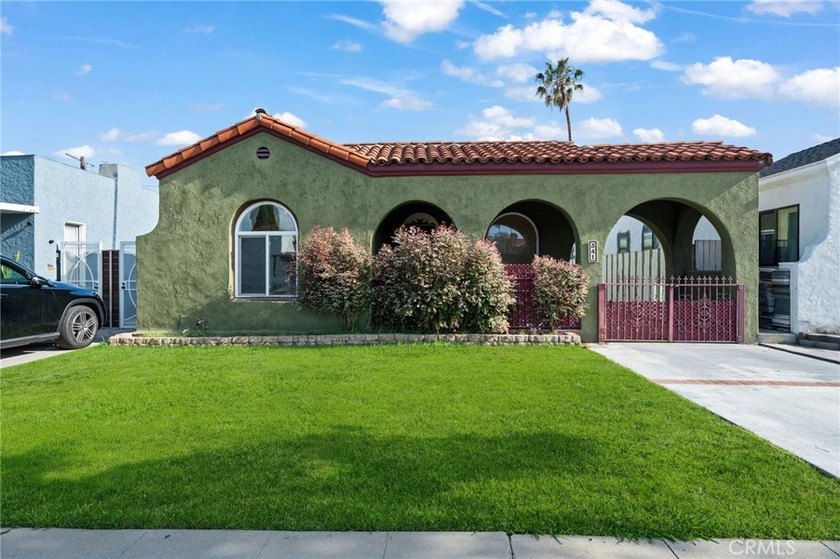 Step into the charm of this enchanting 3-bedroom, 1-bath Spanish - Beach Home for sale in Long Beach, California on Beachhouse.com