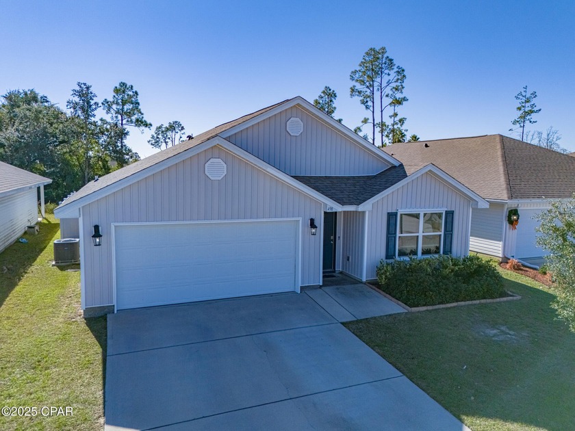 Discover this beautiful Craftsman-style 4 bedroom, 2 bath home - Beach Home for sale in Panama City, Florida on Beachhouse.com