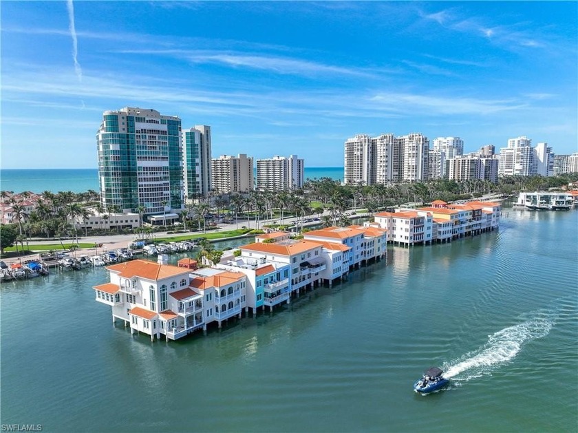 This stunning 3-bedroom, 3-bathroom residence offers an - Beach Condo for sale in Naples, Florida on Beachhouse.com