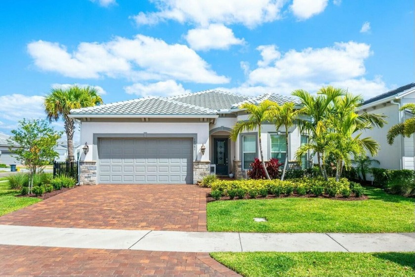 Discover easy luxury living in Avondale at Avenir with this - Beach Home for sale in Palm Beach Gardens, Florida on Beachhouse.com