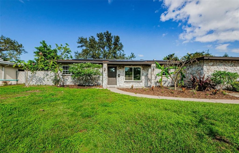 Love where you live! Newly renovated 3 bedroom 2 bath home with - Beach Home for sale in St. Petersburg, Florida on Beachhouse.com