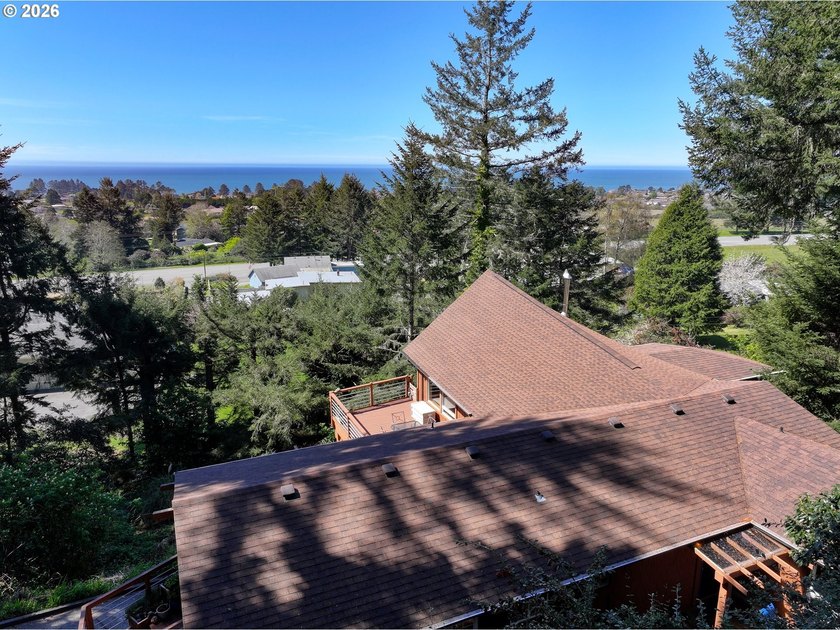 Perched on a serene hillside overlooking the Pacific Ocean and - Beach Home for sale in Brookings, Oregon on Beachhouse.com