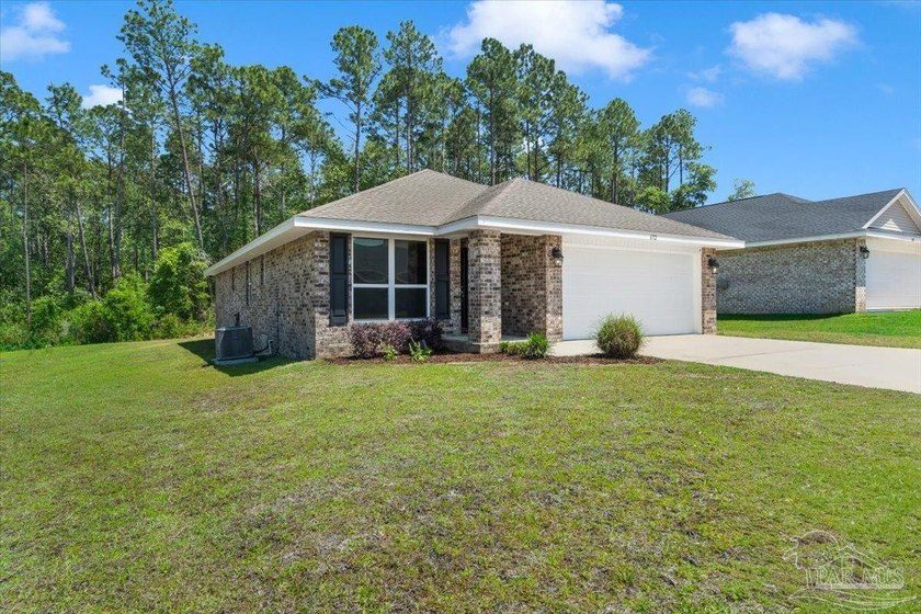 Welcome to this beautifully crafted brick home, perfectly - Beach Home for sale in Pensacola, Florida on Beachhouse.com