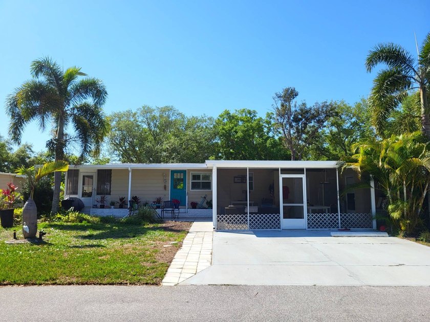 COASTAL ELEGANCE IN A PRIME LOCATION IN THE PARK! A beautiful - Beach Home for sale in Sarasota, Florida on Beachhouse.com