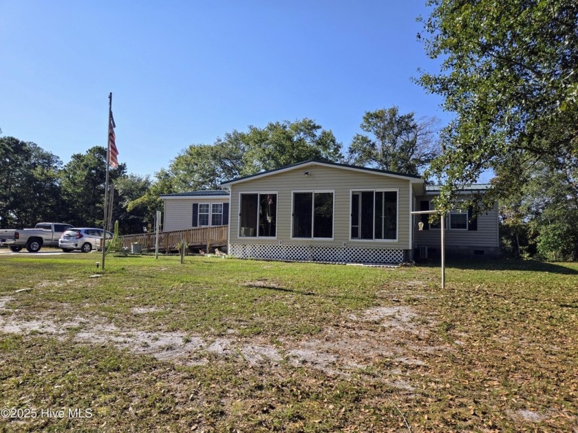 Discover endless possibilities on this creekfront 2.5  acre - Beach Home for sale in Stella, North Carolina on Beachhouse.com