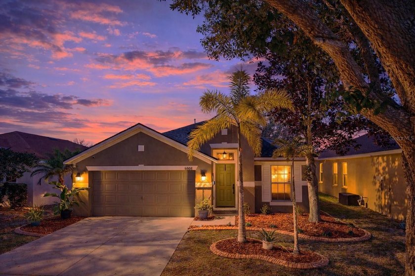 Welcome home to this beautifully maintained 3-bedroom home plus - Beach Home for sale in Apollo Beach, Florida on Beachhouse.com