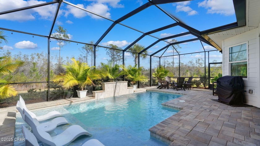 This stunning Breeze Bay w/pool overlooking a preserve with - Beach Home for sale in Panama City Beach, Florida on Beachhouse.com