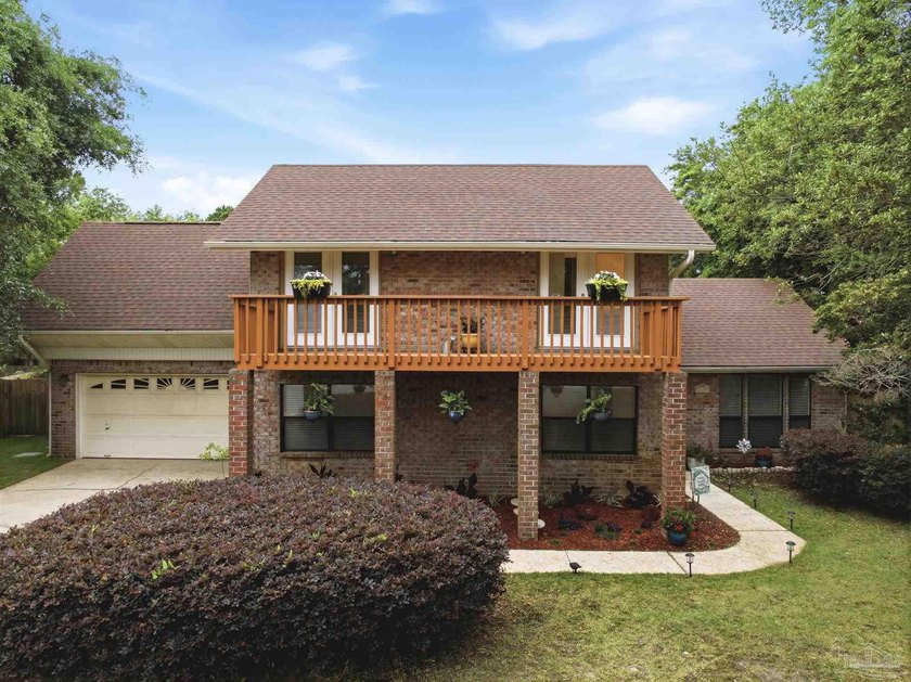 Beautiful two-story pool home with four bedrooms plus a - Beach Home for sale in Gulf Breeze, Florida on Beachhouse.com