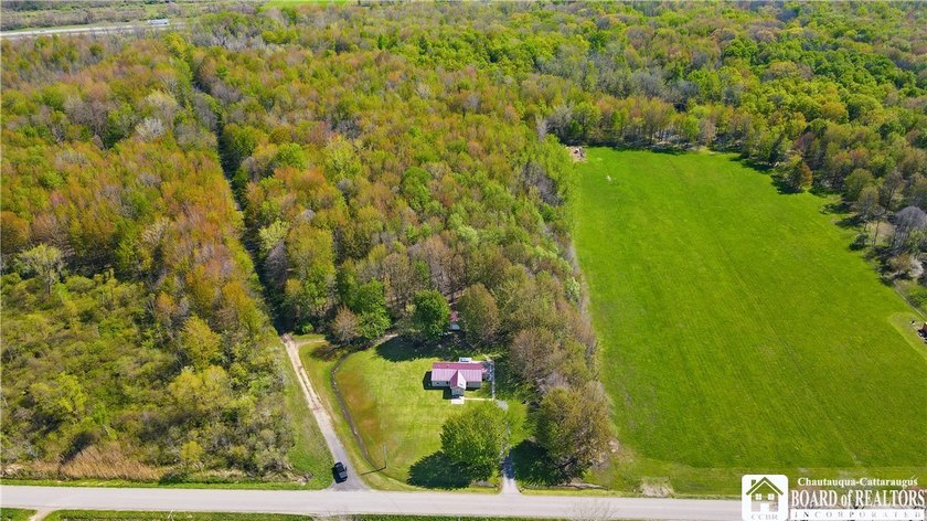 Nestled on 8 scenic acres in the Town of Sheridan, this - Beach Home for sale in Silver Creek, New York on Beachhouse.com