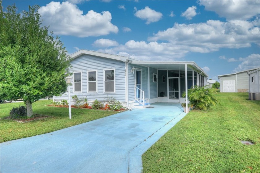 Cute as a button! One of the least expensive homes on the market - Beach Home for sale in Barefoot Bay, Florida on Beachhouse.com