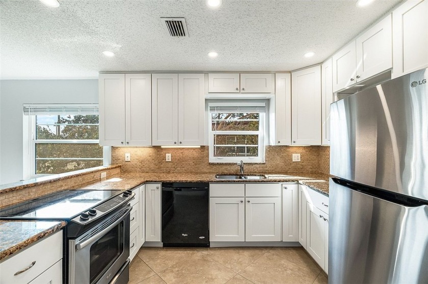 Fantastic remodel with impact glass throughout in this coveted - Beach Home for sale in Vero Beach, Florida on Beachhouse.com