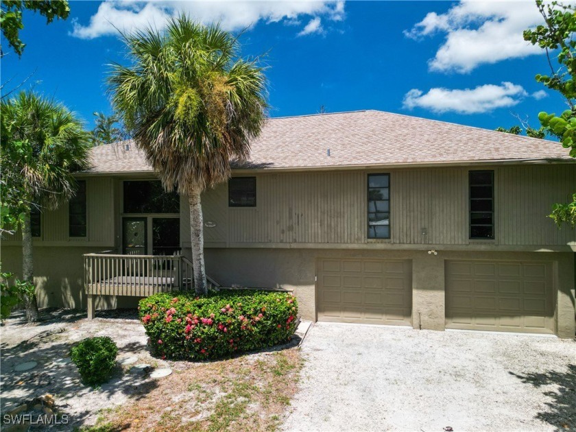 Experience Sanibel Island beach living in this three-bedroom - Beach Home for sale in Sanibel, Florida on Beachhouse.com