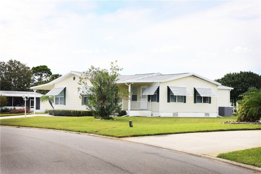 Inviting Triple Wide home on roomy corner double lot. Spacious - Beach Home for sale in Barefoot Bay, Florida on Beachhouse.com