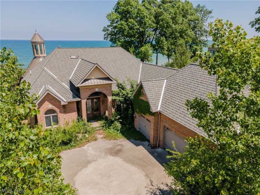 This is truly a special opportunity! This custom home has so - Beach Home for sale in Sheffield Lake, Ohio on Beachhouse.com
