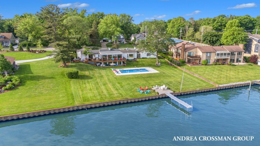 Experience unparalleled waterfront living on Lake Macatawa with - Beach Home for sale in Holland, Michigan on Beachhouse.com