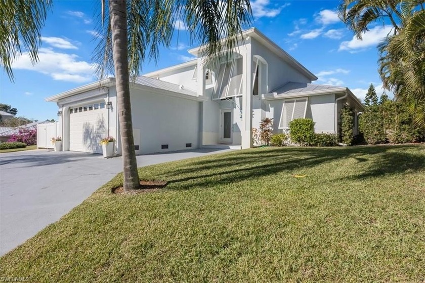 This turnkey furnished 4+ bedroom home sits on an elevated - Beach Home for sale in Marco Island, Florida on Beachhouse.com
