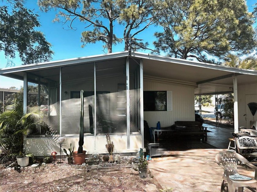 LOVELY COTTAGE ON THE BEAUTIFUL BACK YARD with a BUBBLING CREEK - Beach Home for sale in Largo, Florida on Beachhouse.com