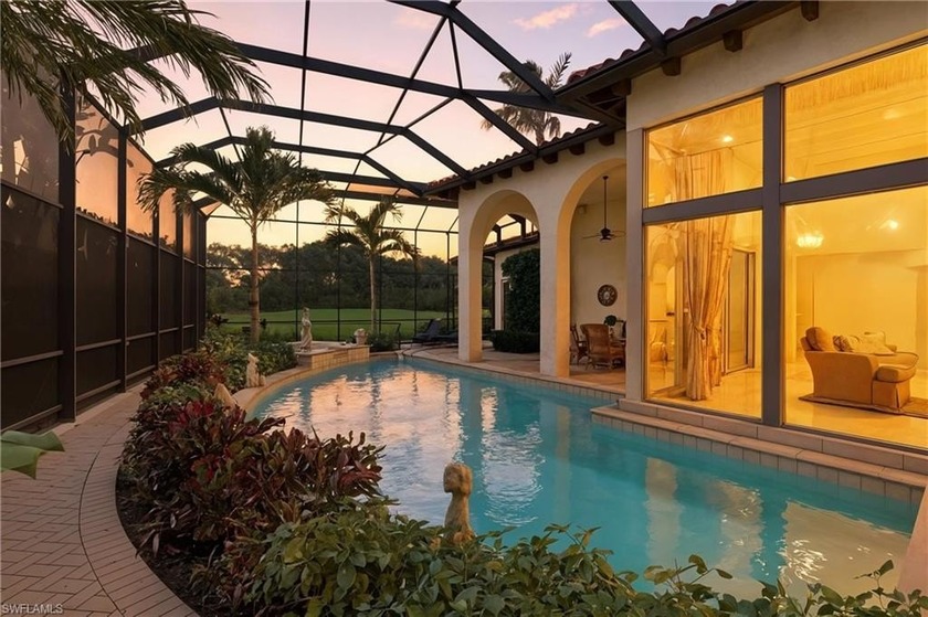 Stunning lake and golf course views surround this elegant - Beach Home for sale in Naples, Florida on Beachhouse.com