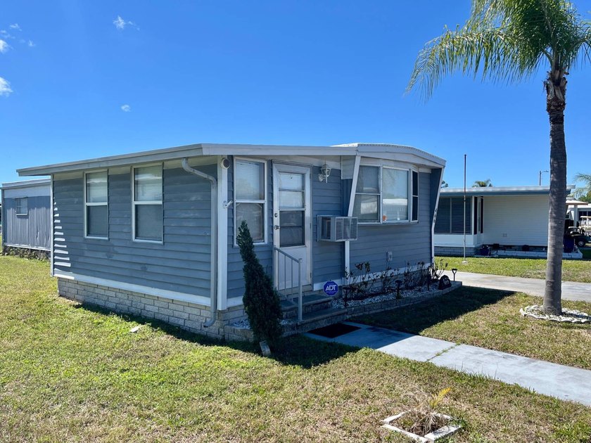 Great location and opportunity to settle into Florida living at - Beach Home for sale in Largo, Florida on Beachhouse.com