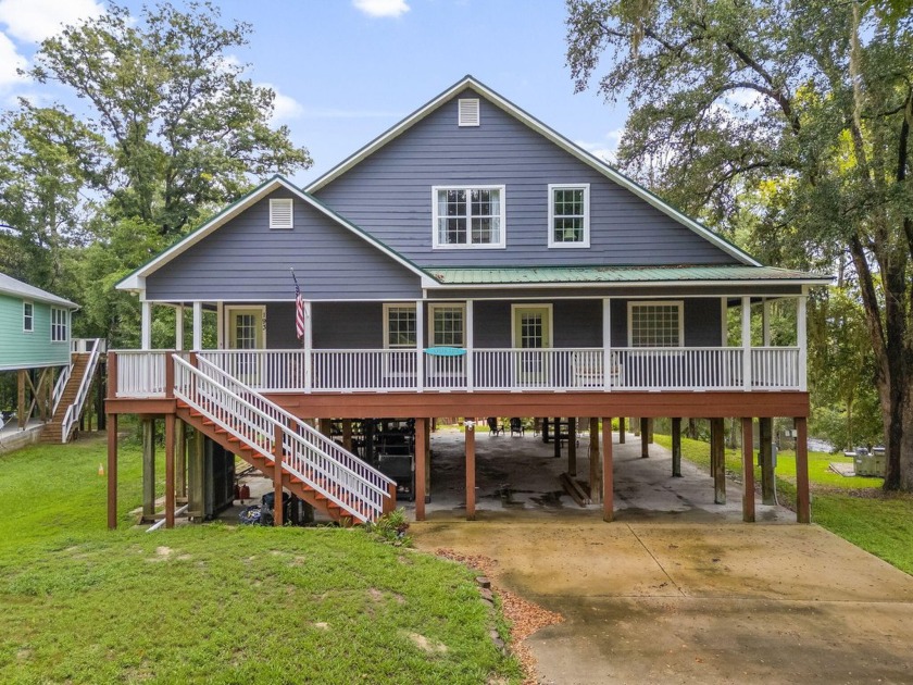 Deep-water access with boat slip! This high-elevation waterfront - Beach Home for sale in Freeport, Florida on Beachhouse.com