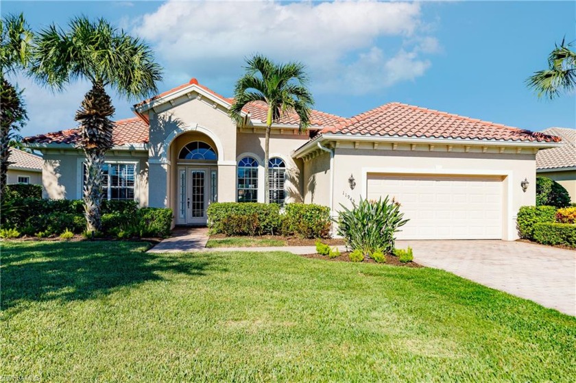STUNNING LAKE & GOLF VIEWS!  This exceptional residence has - Beach Home for sale in Naples, Florida on Beachhouse.com