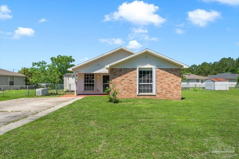Located in Bay Pine Villas, this charming 3 bedroom, 2 bath home - Beach Home for sale in Pensacola, Florida on Beachhouse.com
