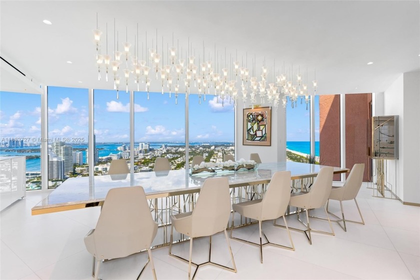 Experience the pinnacle of luxury in this tri-level penthouse - Beach Condo for sale in Miami Beach, Florida on Beachhouse.com