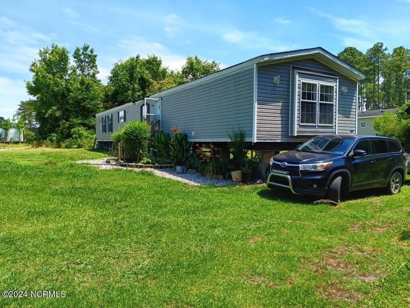 Imagine a serene rural setting with water access where you have - Beach Home for sale in Belhaven, North Carolina on Beachhouse.com