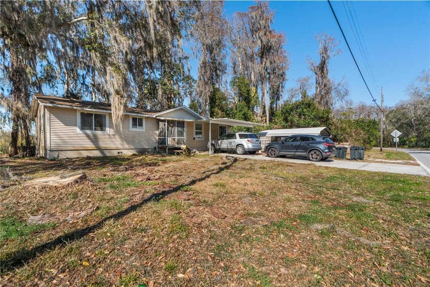 SKI! SWIM! FISH! Lakefront canal property! MOON LAKE! Enjoy this - Beach Home for sale in New Port Richey, Florida on Beachhouse.com
