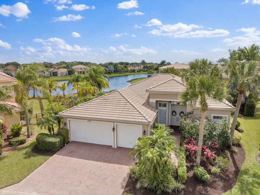 This elegant lakefront home features 4BR 3BA 3CG, nestled on a - Beach Home for sale in Vero Beach, Florida on Beachhouse.com