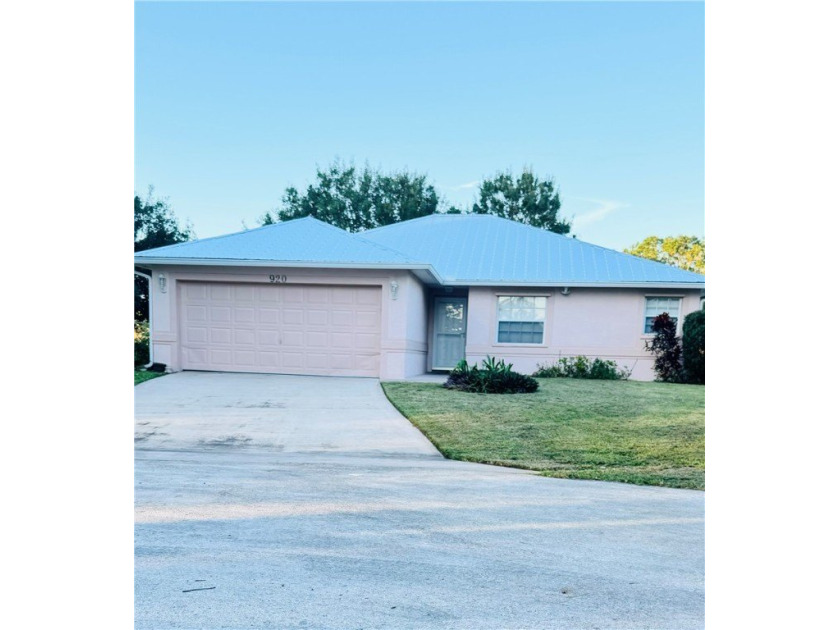 This concrete block, 2 bedrooms, 2 full bathrooms, 2 car garage - Beach Home for sale in Vero Beach, Florida on Beachhouse.com