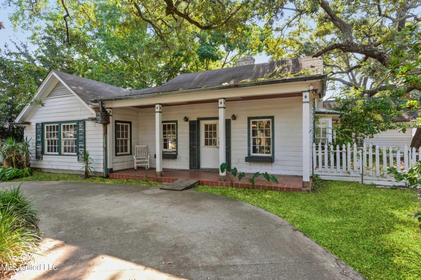 This heritage home, featuring four bedrooms and two full baths - Beach Home for sale in Biloxi, Mississippi on Beachhouse.com