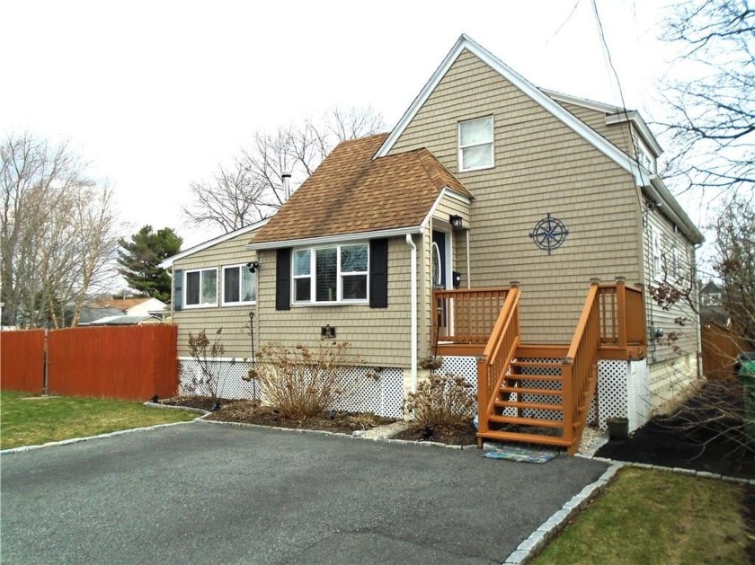 Modern upgrades mingle with timeless character in this beautiful - Beach Home for sale in Warwick, Rhode Island on Beachhouse.com