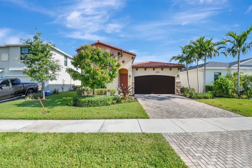 This Waterfront, 3 way split bedroom plan, 3 full bathroom home - Beach Home for sale in West Palm Beach, Florida on Beachhouse.com