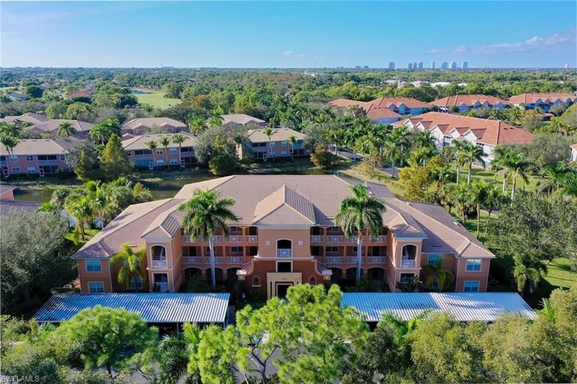 Wake up to tranquil lake views and an easy, coastal rhythm in - Beach Condo for sale in Bonita Springs, Florida on Beachhouse.com