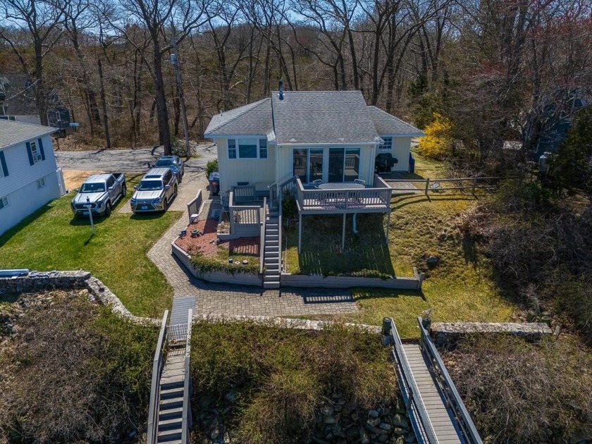 Cottage on waterfront with beautiful views.  Dock, sit on your - Beach Home for sale in North Kingstown, Rhode Island on Beachhouse.com