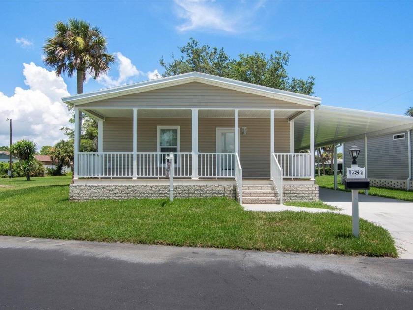 This beautiful new Skyline/Champion Home has a beautiful front - Beach Home for sale in Daytona Beach, Florida on Beachhouse.com