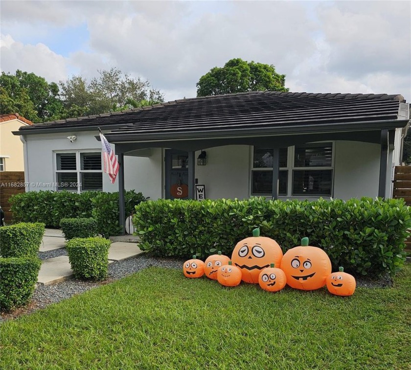 Cozy Beautiful Remolded 3/2 Home w/ New Roof, Impact windows & - Beach Home for sale in Miami Springs, Florida on Beachhouse.com