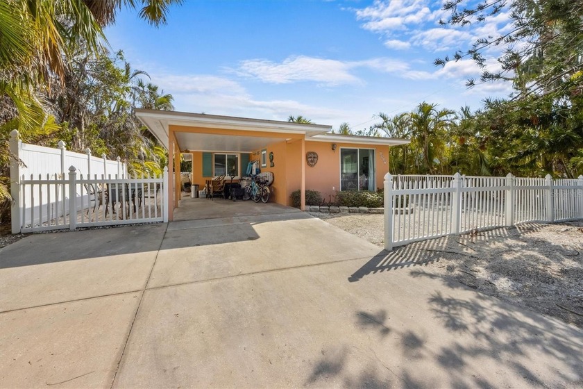 This charming ground-level 3-bedroom, 2-bathroom home with a - Beach Home for sale in Holmes Beach, Florida on Beachhouse.com