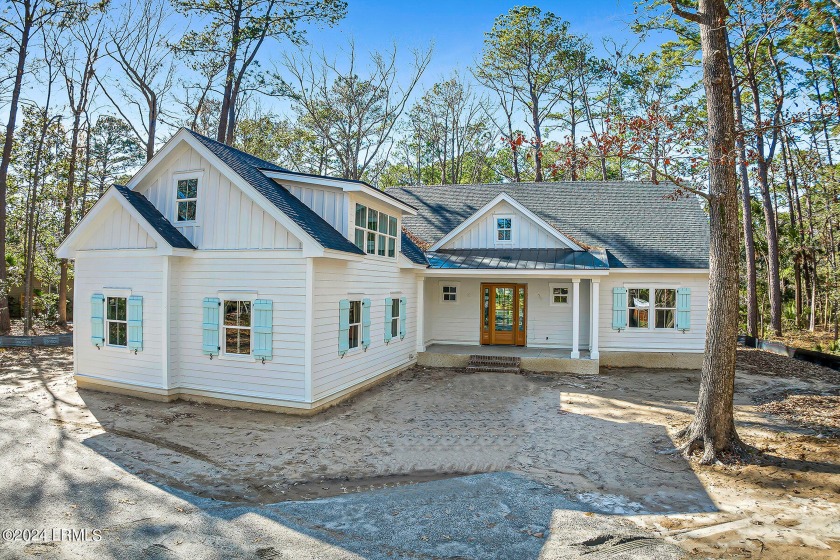 This new construction 4-BR, 4.5-bath beauty is thoughtfully - Beach Home for sale in Okatie, South Carolina on Beachhouse.com